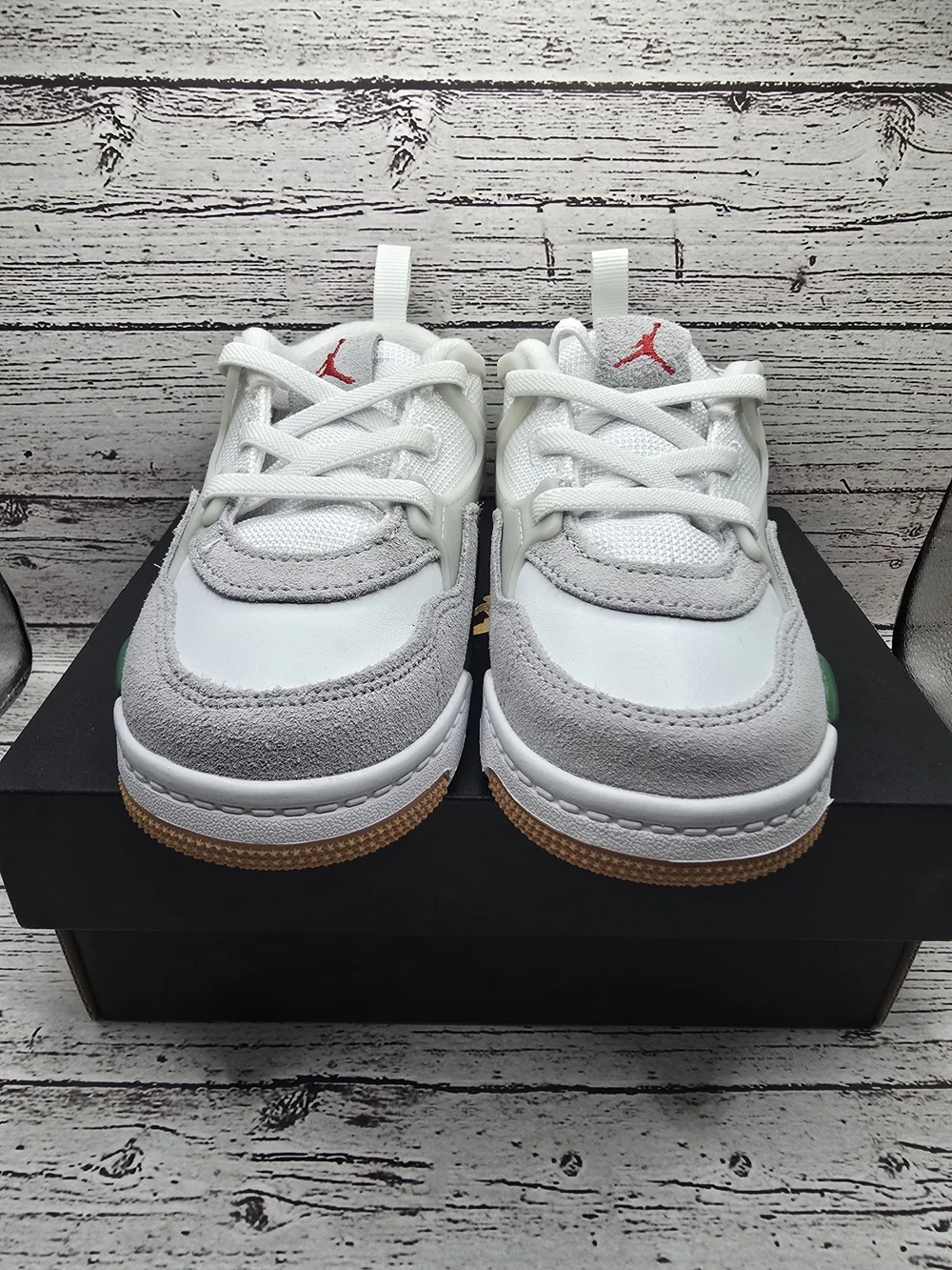 Jordan 4 RM Kids' White and Gray Athletic Sneakers with Green Accents